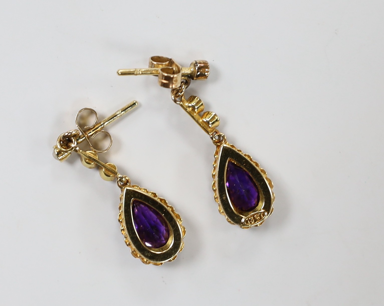 A pair of late Victorian, 15ct, amethyst and seed pearl set drop earrings, 29mm, gross weight 3.5 grams.